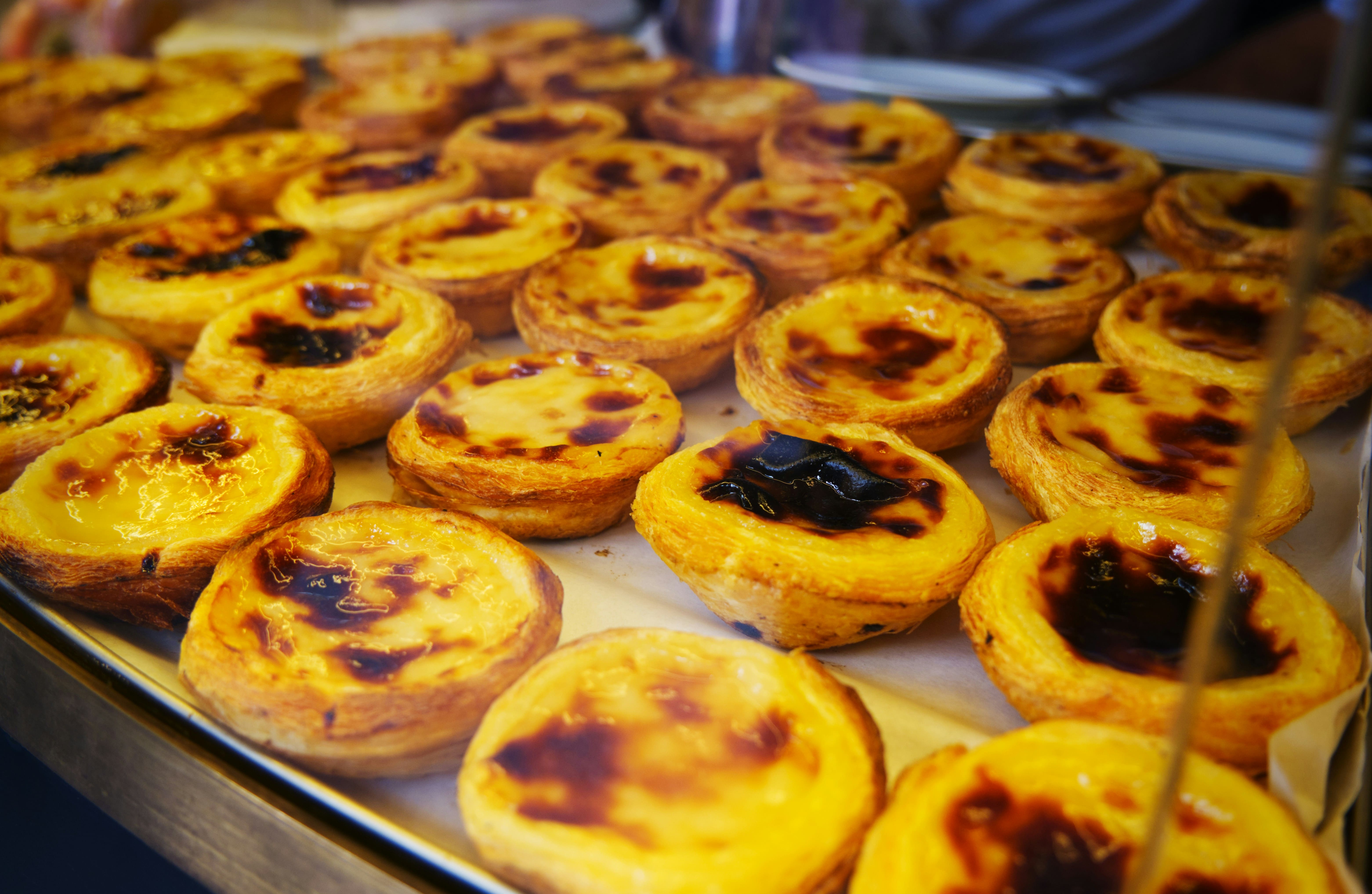 Traditional pastel de nata custard tart with cinnamon